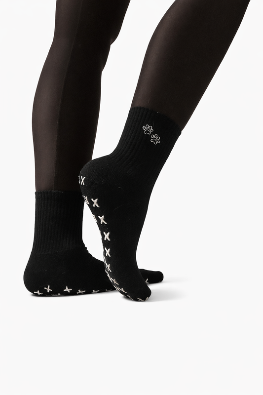The black on white grip socks (60% goes to the Animal foundation program)